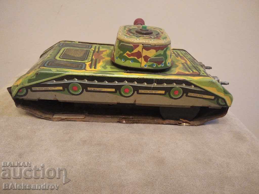 Livrarea Jucărie mecanică veche din tablă Livrarea Jucărie mecanică veche din tablă