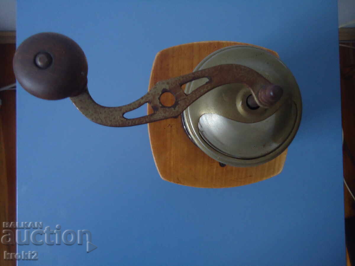 Delivery of Old retro wooden coffee grinder Delivery of Old retro wooden coffee grinder