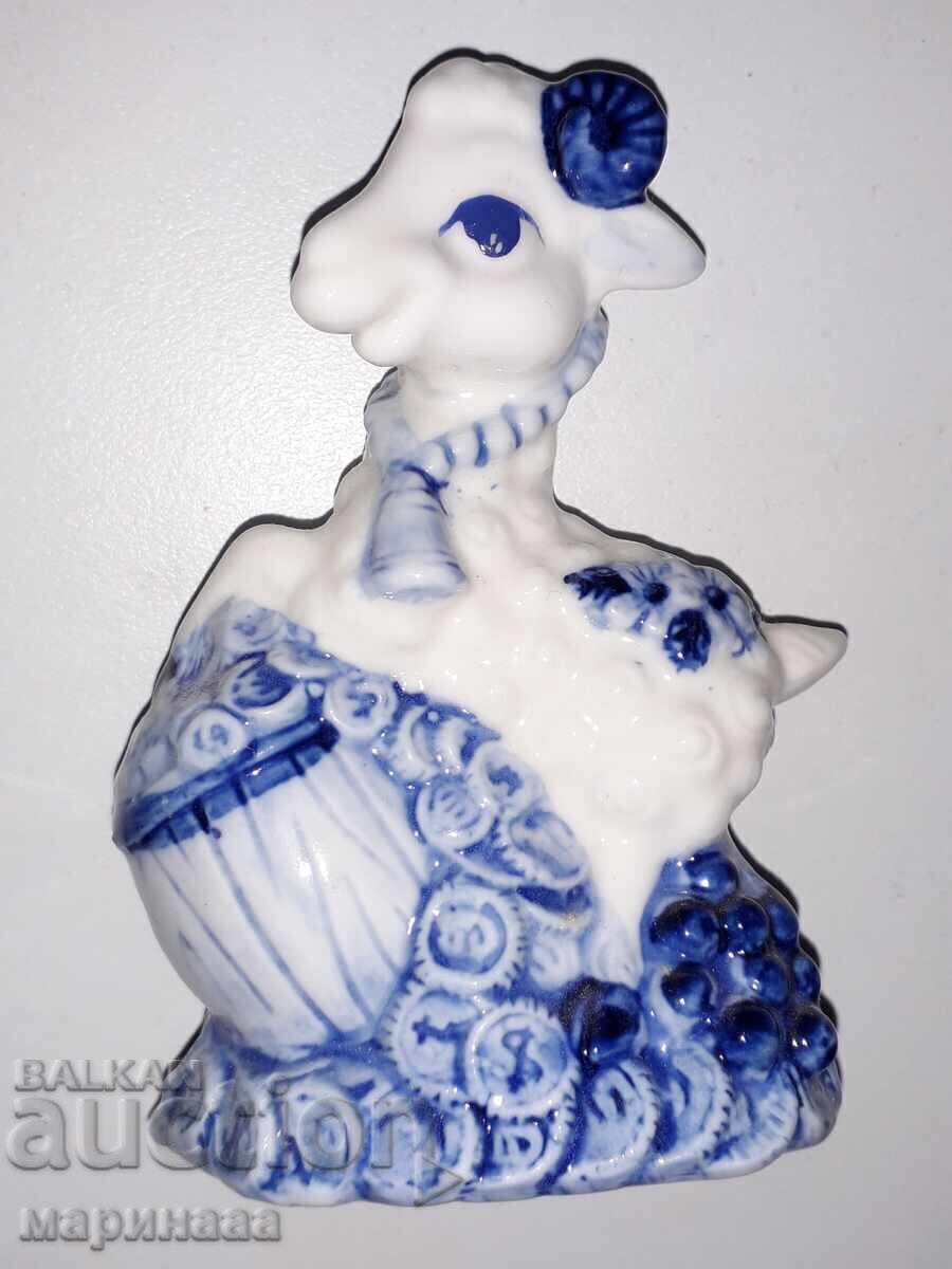 FIGURINE-PIGGY BANK. PORCELAIN