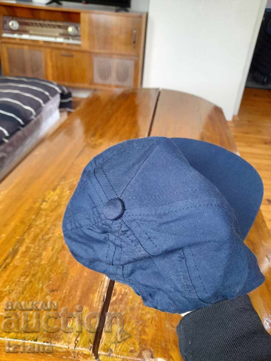 Livrarea Pălărie veche Pompier Livrarea Pălărie veche Pompier