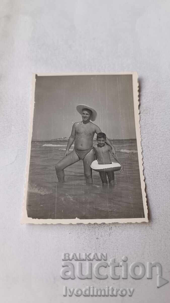 Снимка Несебър Мъж момченце с пояс на брега на морето 1961