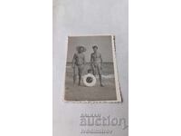 C-ka Nessebar Men and a little boy with a life preserver on the seashore 1961