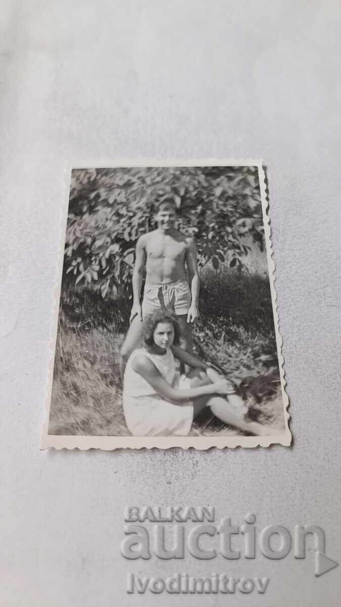 Photo: Young Man and Young Girl in the Meadow Photo: Young Man and Young Girl in the Meadow