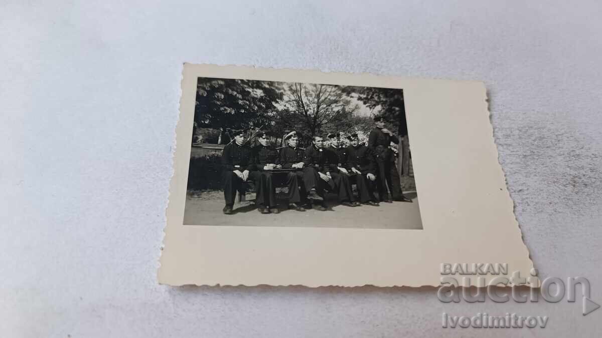 Photograph Sofia Students from 6th grade sitting on a bench in the park 1943