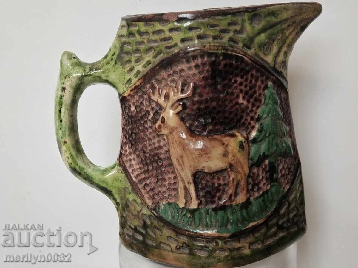 Δημοπρασία Ανάγλυφη τροία κανάτα μινιόν 12εκ. κεραμική τέλη 19ου αιώνα