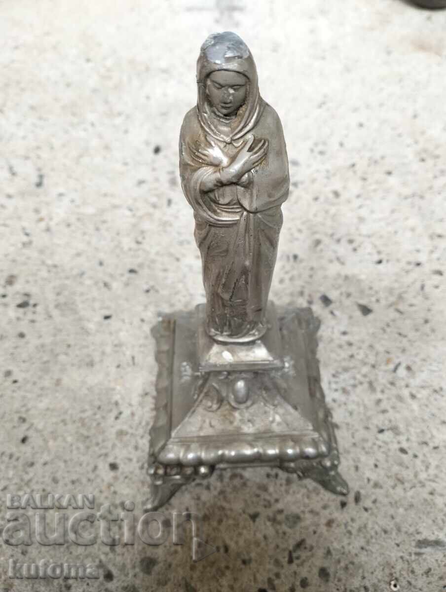 Metal figure of the Virgin Mary