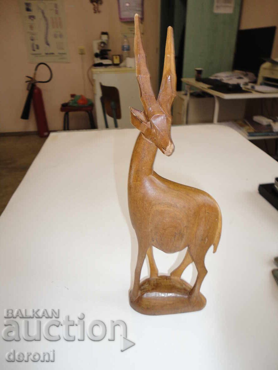 Auction  Wooden antelope gazelle figure