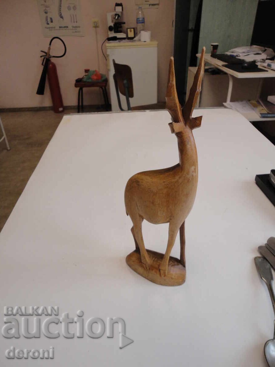Delivery of Wooden antelope gazelle figure