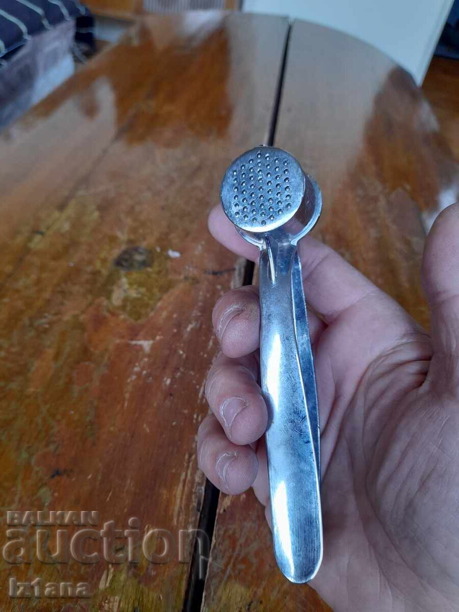 Auction  Old garlic press
