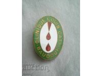 Insigna - Clinica Louis Caty, Belgia. Email