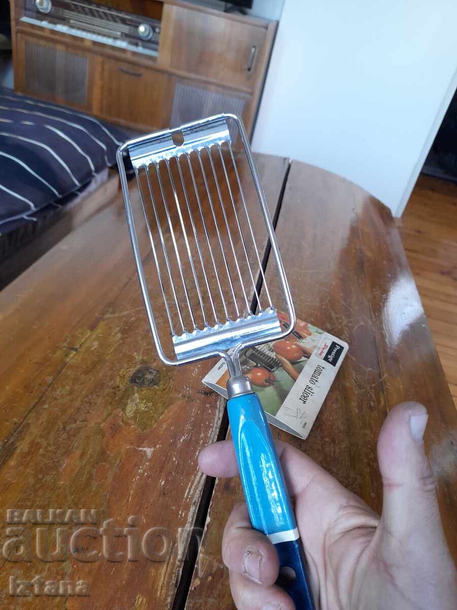 Παράδοση Παλιό οικιακό μηχάνημα κοπής ντομάτας