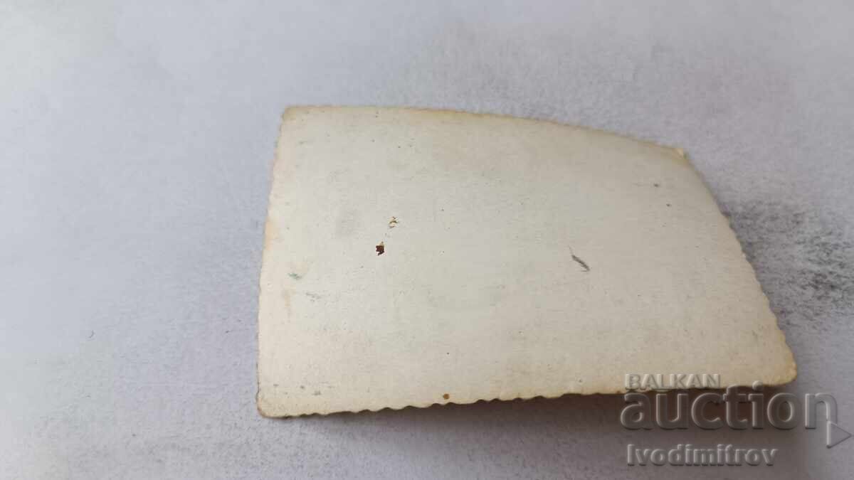 Photo of Three Young Men and a Young Woman on the Beach with price 1.85 BGN | € 0.95