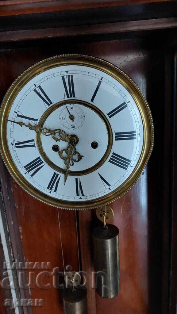 Δημοπρασία Μασίφ επιτοίχιο μηχανικό ρολόι - τέλη του 19ου αιώνα με βαρίδια Δημοπρασία Μασίφ επιτοίχιο μηχανικό ρολόι - τέλη του 19ου αιώνα με βαρίδια