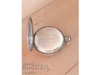 Silver Omega pocket watch case