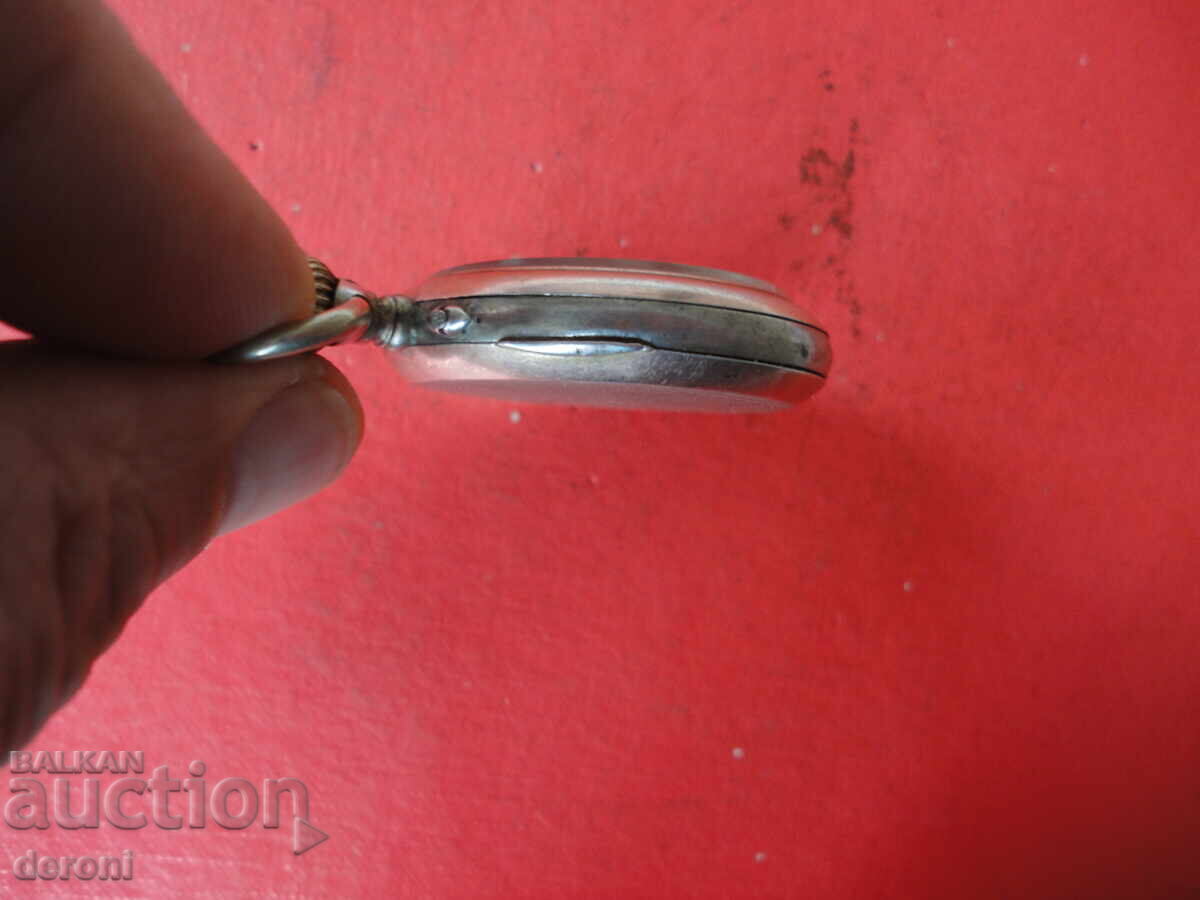Auction  Silver pocket watch 9