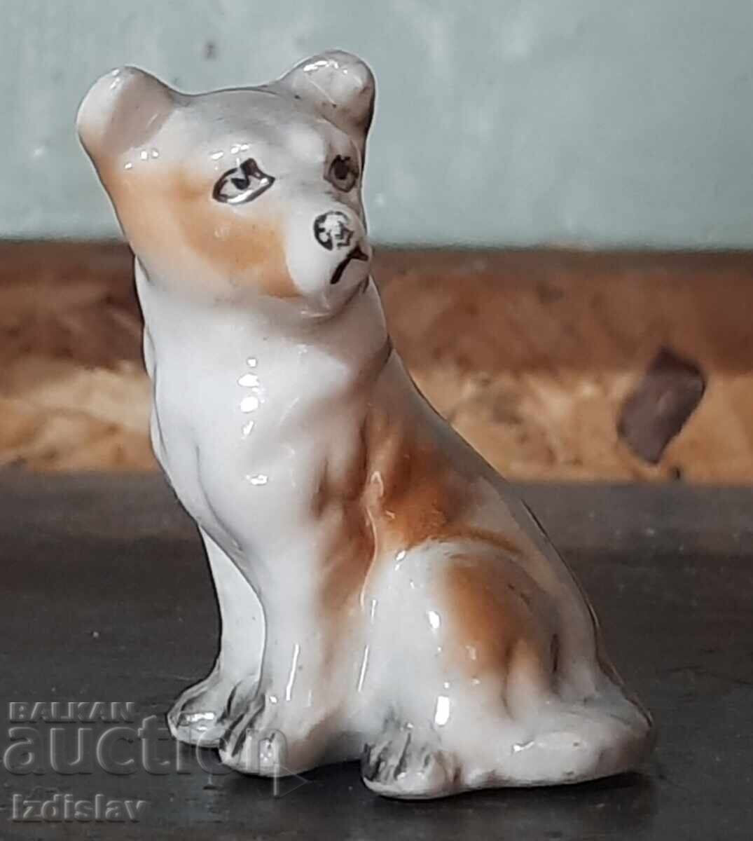 Auction  Porcelain dog figurine
