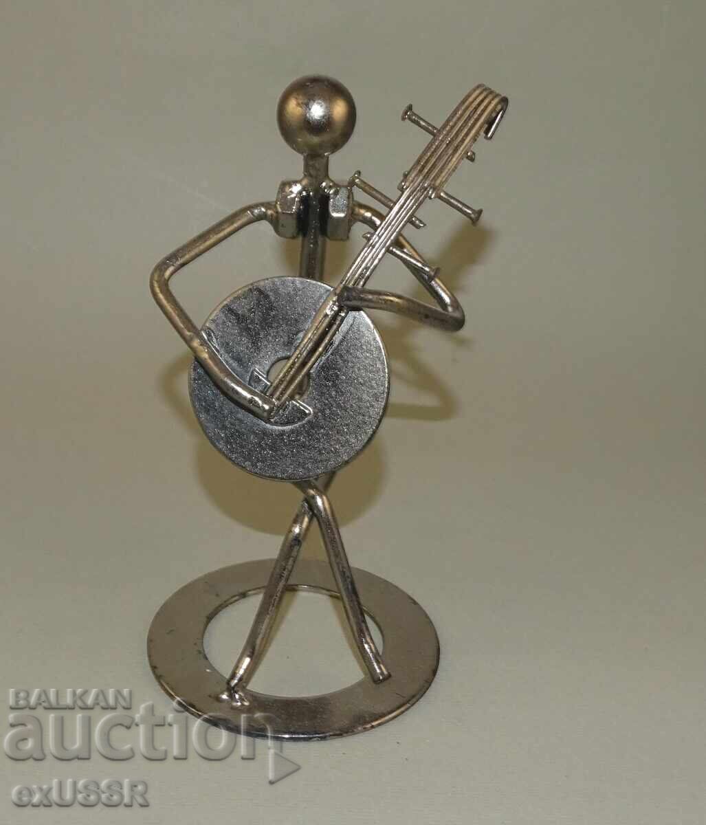 Metal musician figure, nuts
