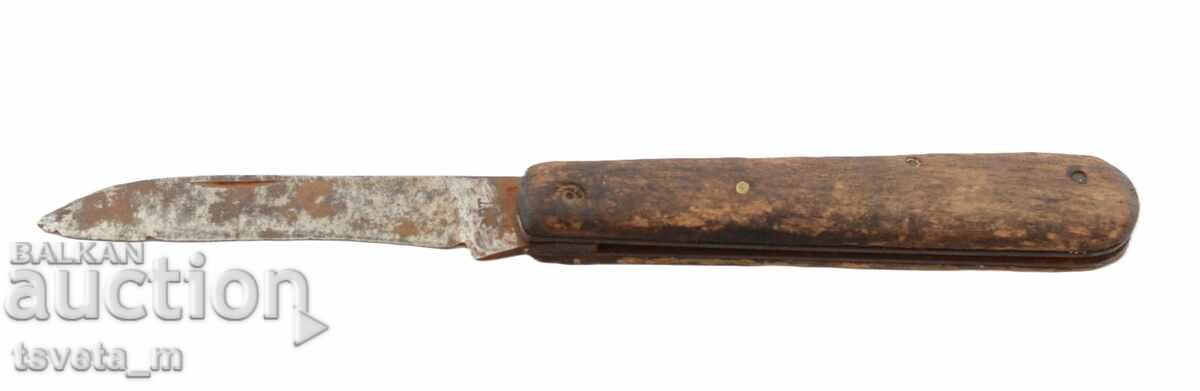 Auction  Pocket knife with wooden handle