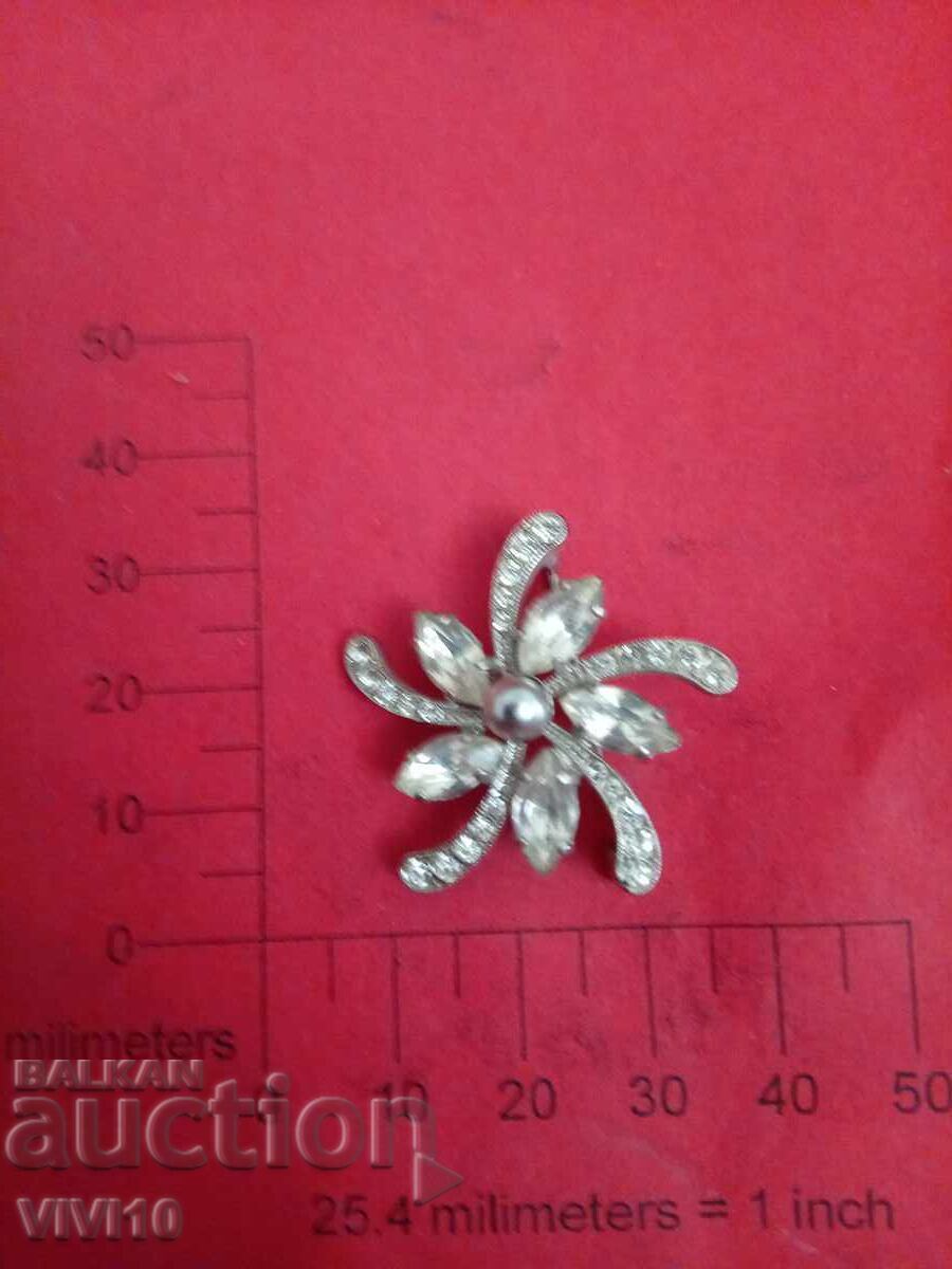 Antique brooch with stones