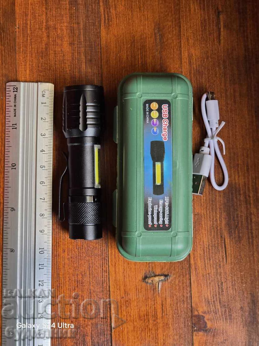 Auction  Brand new super powerful flashlight with USB cable. I'm listing it on