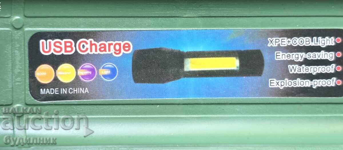 Brand new super powerful flashlight with USB cable. I'm listing it on - 5