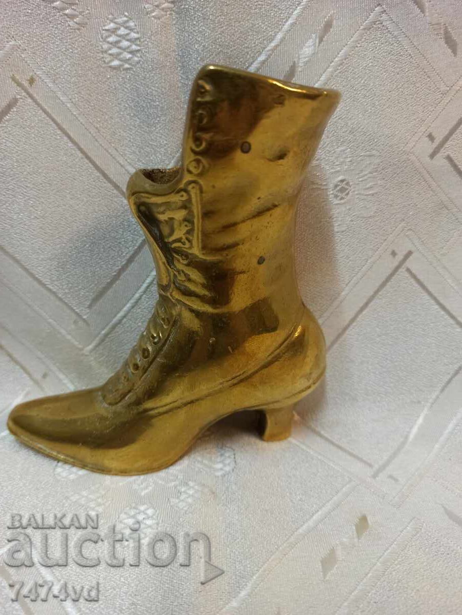 Massive bronze sculpture of a woman's shoe with price 100.00 BGN | € 51.13 Massive bronze sculpture of a woman's shoe with price 100.00 BGN | € 51.13