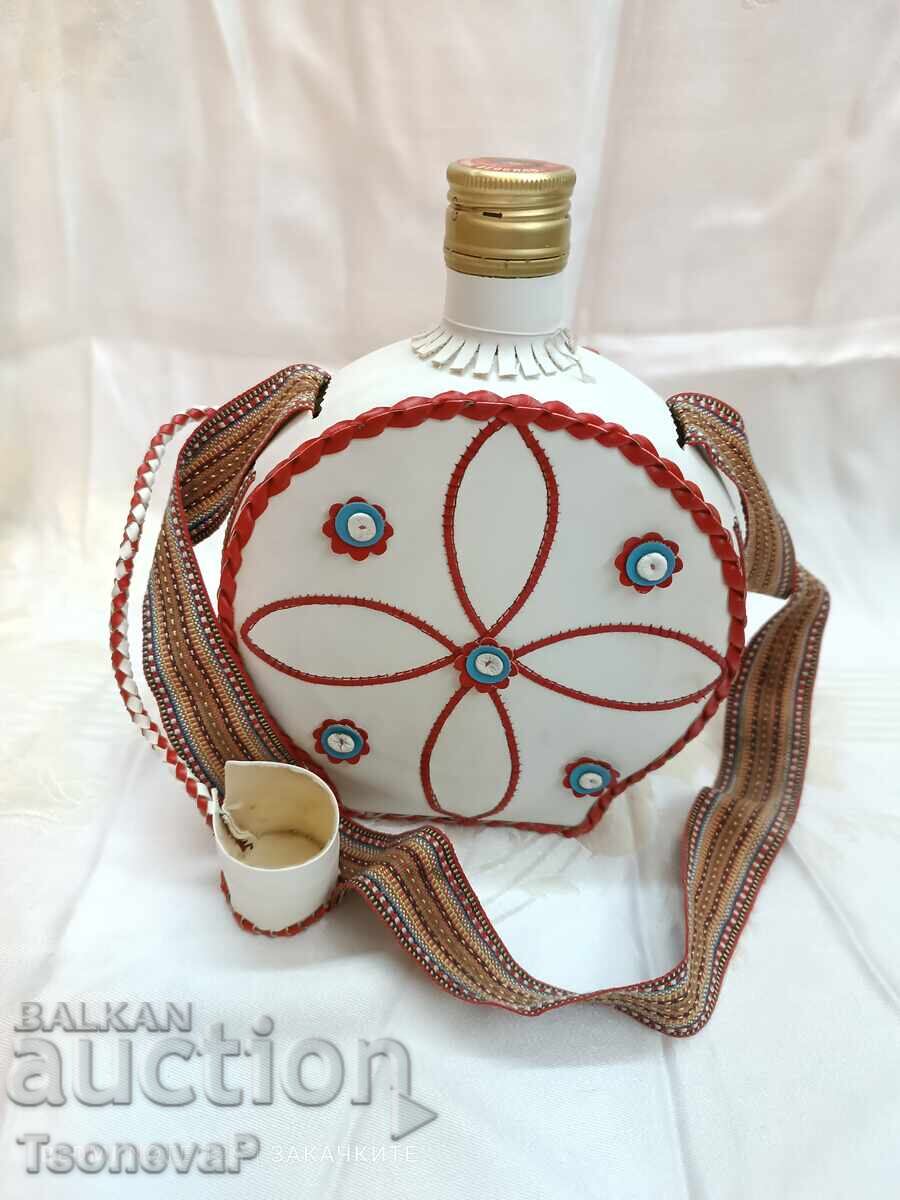 Delivery of Glass flask with a lid, hand-covered in leather Delivery of Glass flask with a lid, hand-covered in leather