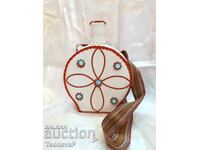 Glass flask with a lid, hand-covered in leather