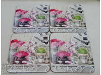 Set of English coasters with cork backing