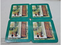 Set of English coasters with cork backing