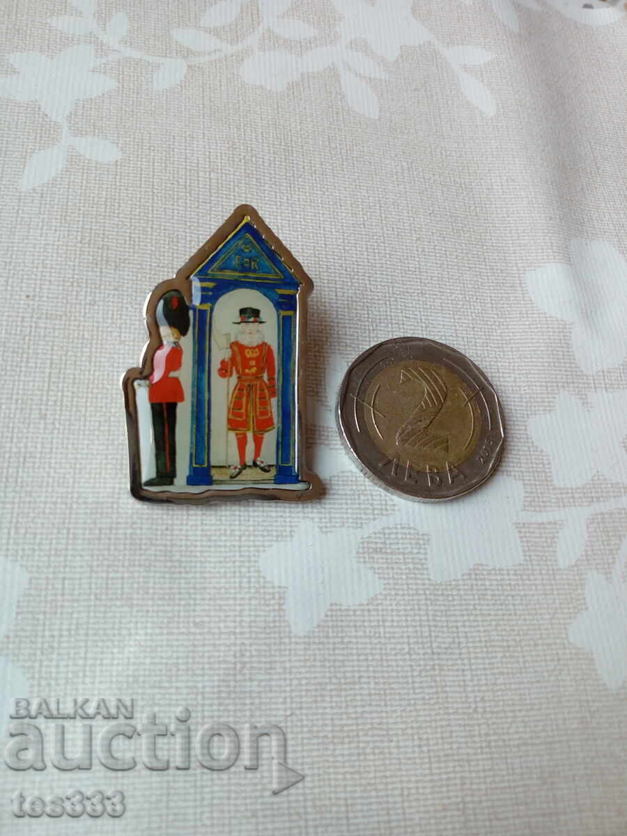 Milly Green pin badge