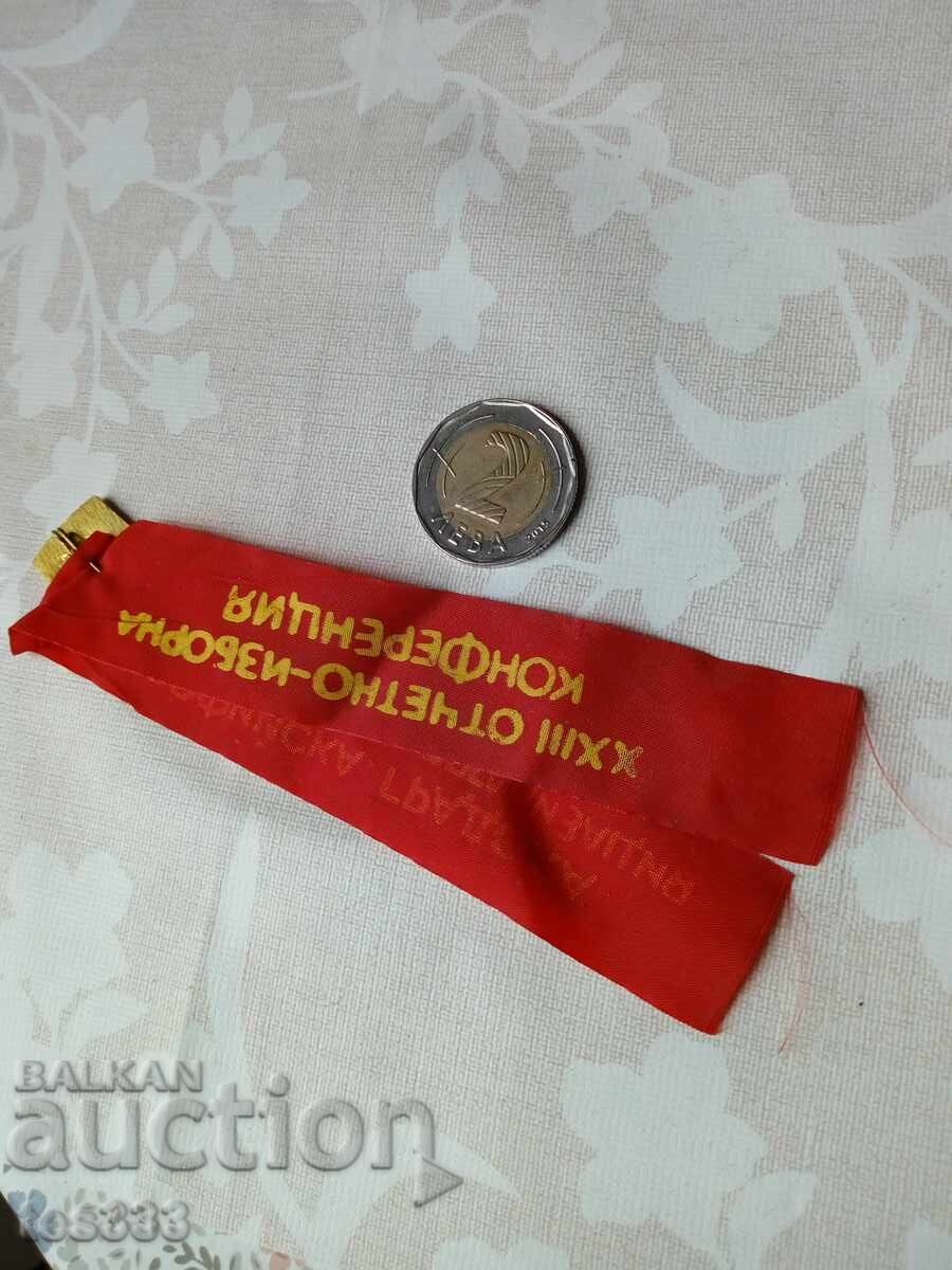 Delivery of DKMS badge with ribbon