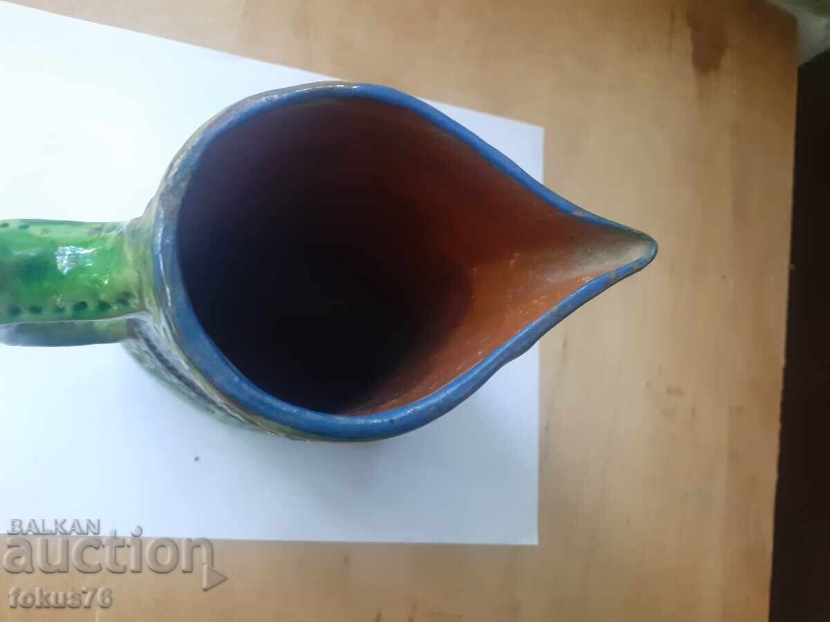 Delivery of Old relief glazed pitcher for wine, Troyan ceramics