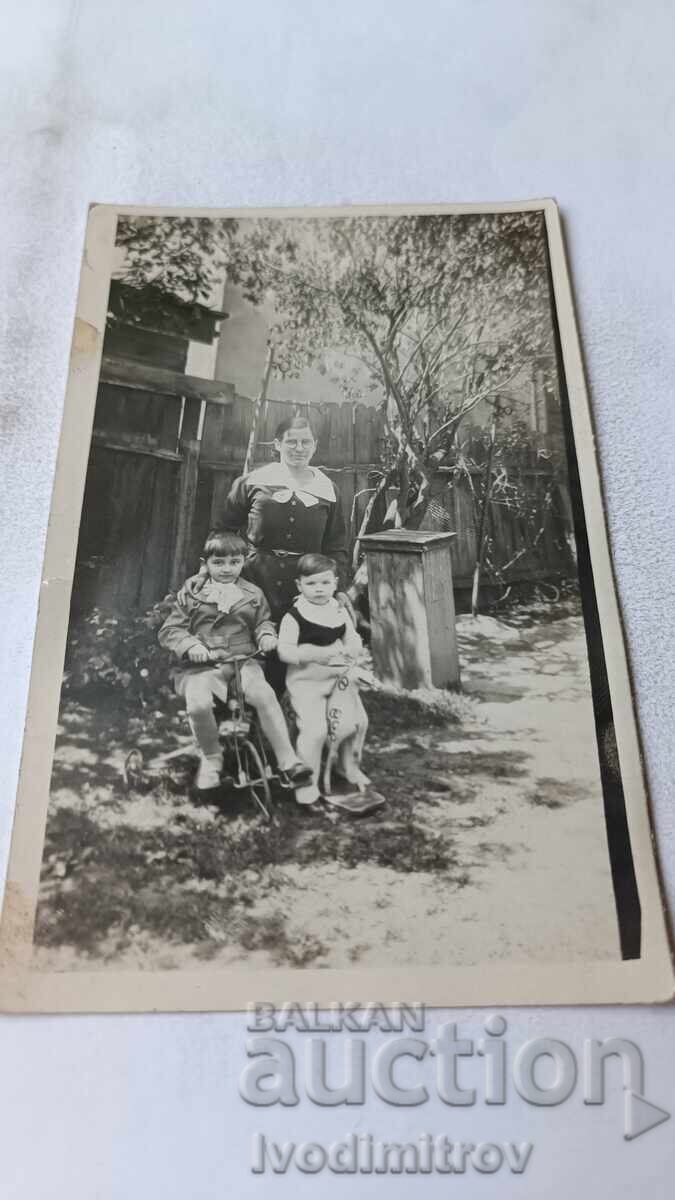Sofia Photo Woman boy and girl in the yard of a house 1935