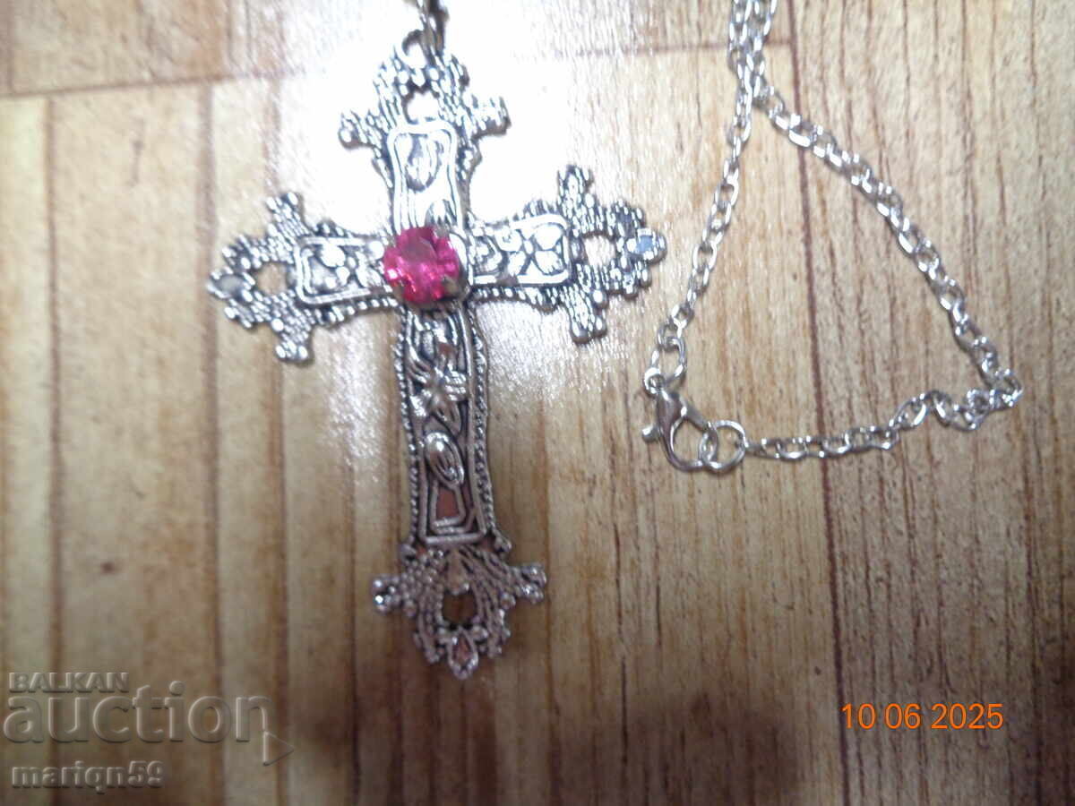 Beautiful metal Cross with a beautiful stone and chain with price 7.00 BGN | € 3.58 Beautiful metal Cross with a beautiful stone and chain with price 7.00 BGN | € 3.58