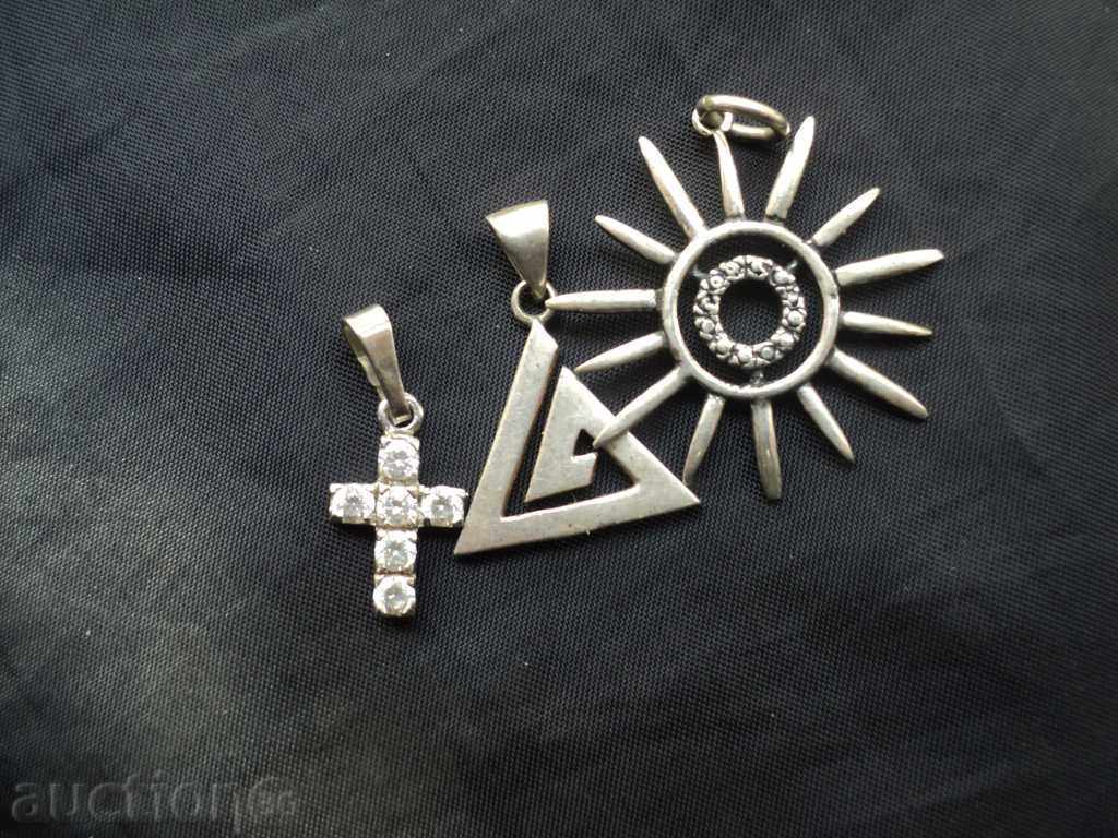 Selling three silver pendants