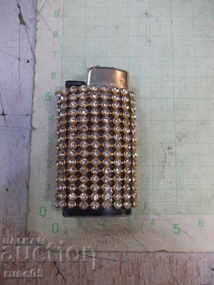 Clipper gas lighter with soft flame, encrusted with stones with price 10.00 BGN | € 5.11 Clipper gas lighter with soft flame, encrusted with stones with price 10.00 BGN | € 5.11