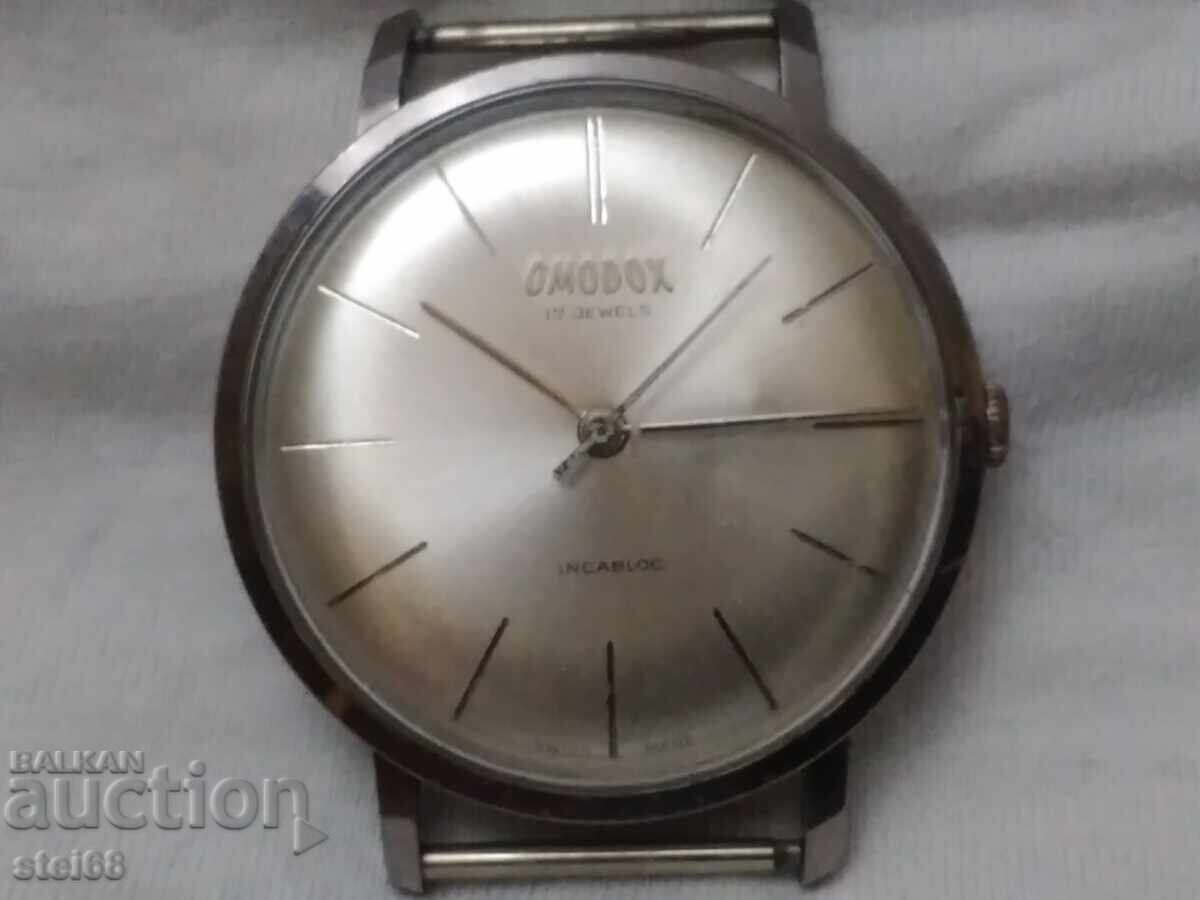 HANDMADE SWISS WATCH --OMODOX