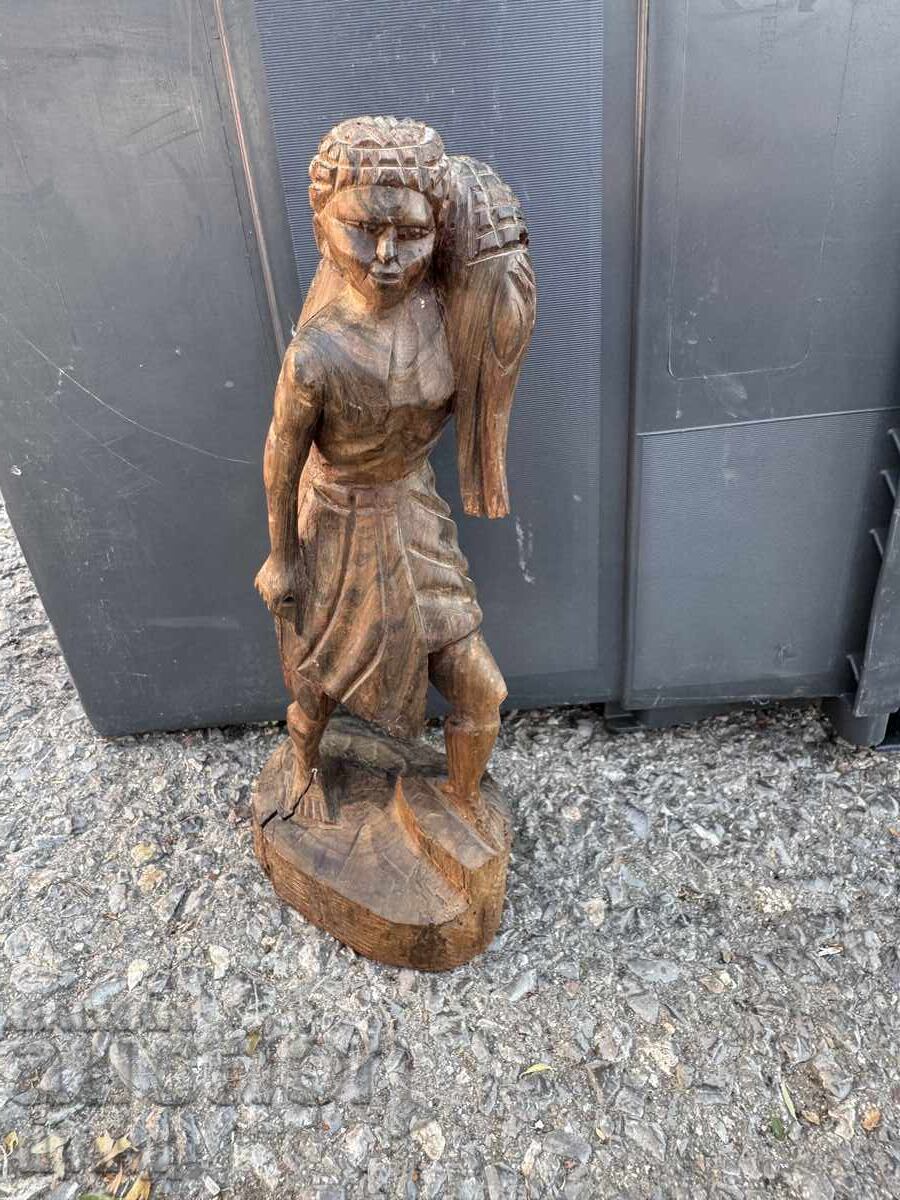 Old wooden figure sculpture