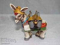 Ceramic donkey with saddlebags