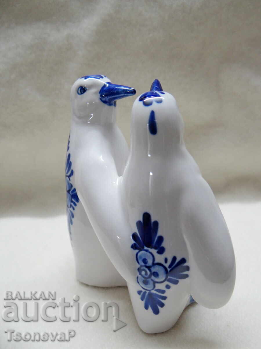 Livrarea Statuetă pinguini Livrarea Statuetă pinguini