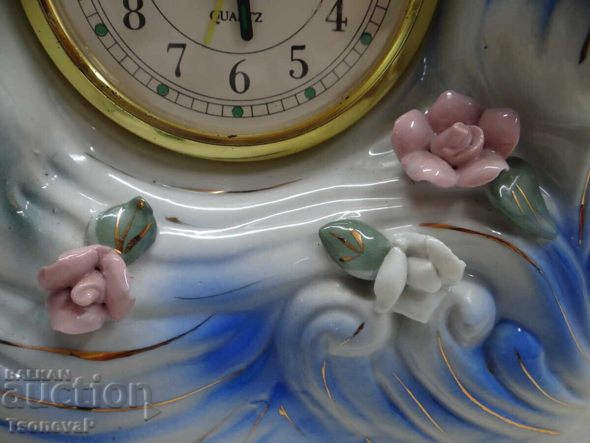 Porcelain clock with dolphins and flowers, working with price 25.00 BGN | € 12.78 Porcelain clock with dolphins and flowers, working with price 25.00 BGN | € 12.78