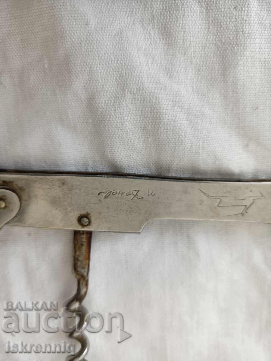 Auction  Corkscrew Leg Opener P. Denev