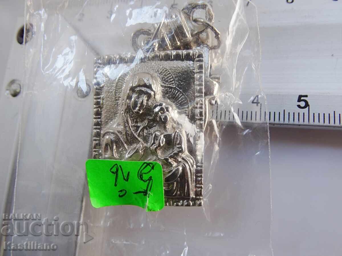Delivery of Christian keychain with an image of the Virgin Mary