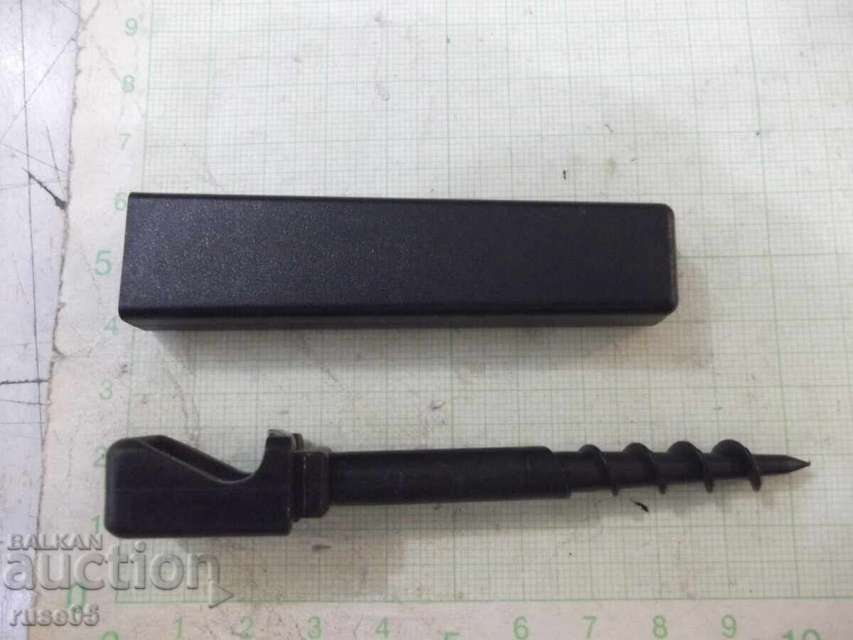 Auction  Corkscrew with bottle opener