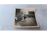 Φωτογραφία Γυναίκα στο πεζοδρόμιο