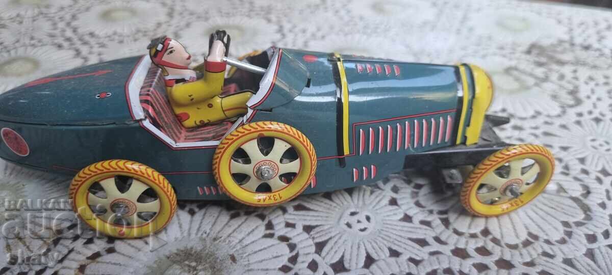 Delivery of Tin toy