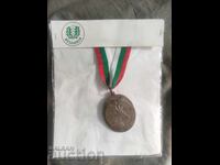 Μετάλλιο κυνηγιού, διάκριση