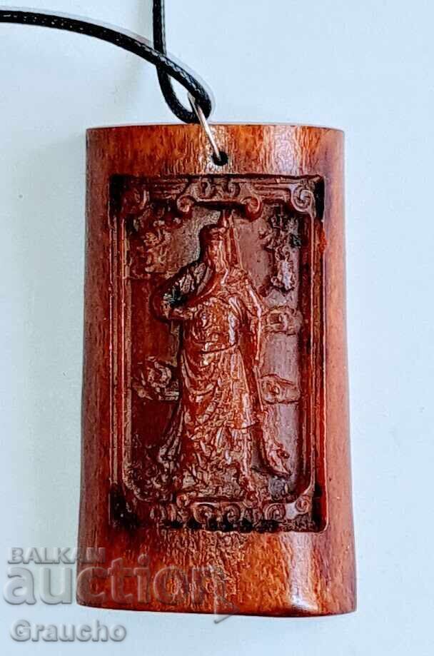 Auction  Amulet pendant made of bone for protection, compassion, and blessing