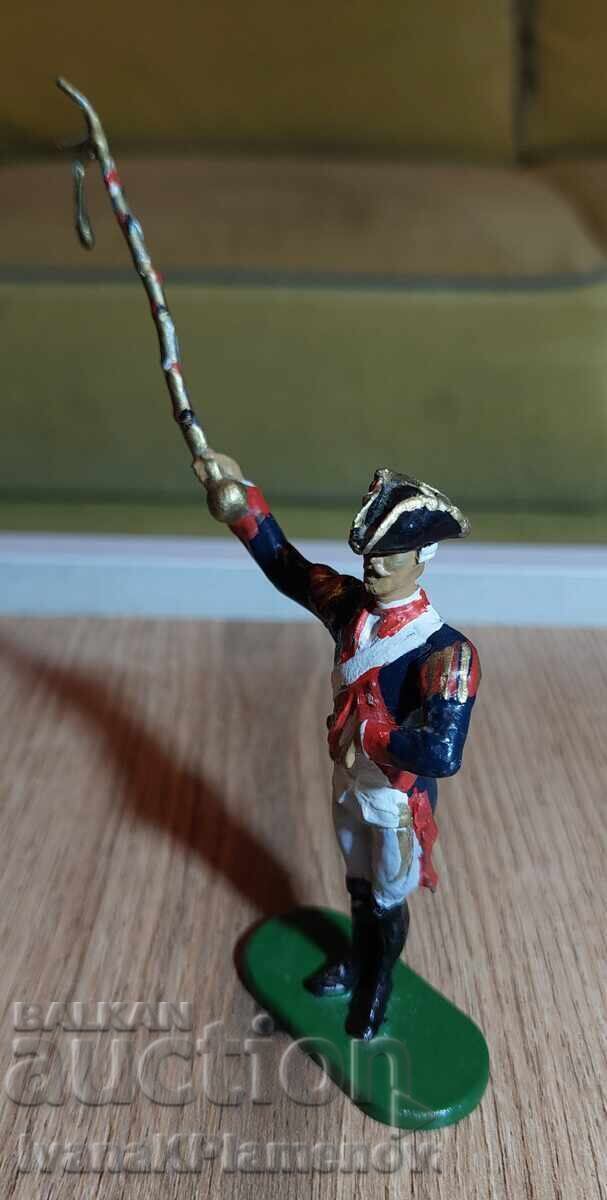 Livrarea O figurină de plumb pentru colecționari